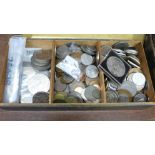 A tin of commemorative crowns, coins including silver, foreign, etc.