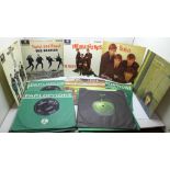 The Beatles and solo, twenty 45rpm 7" singles and EP's