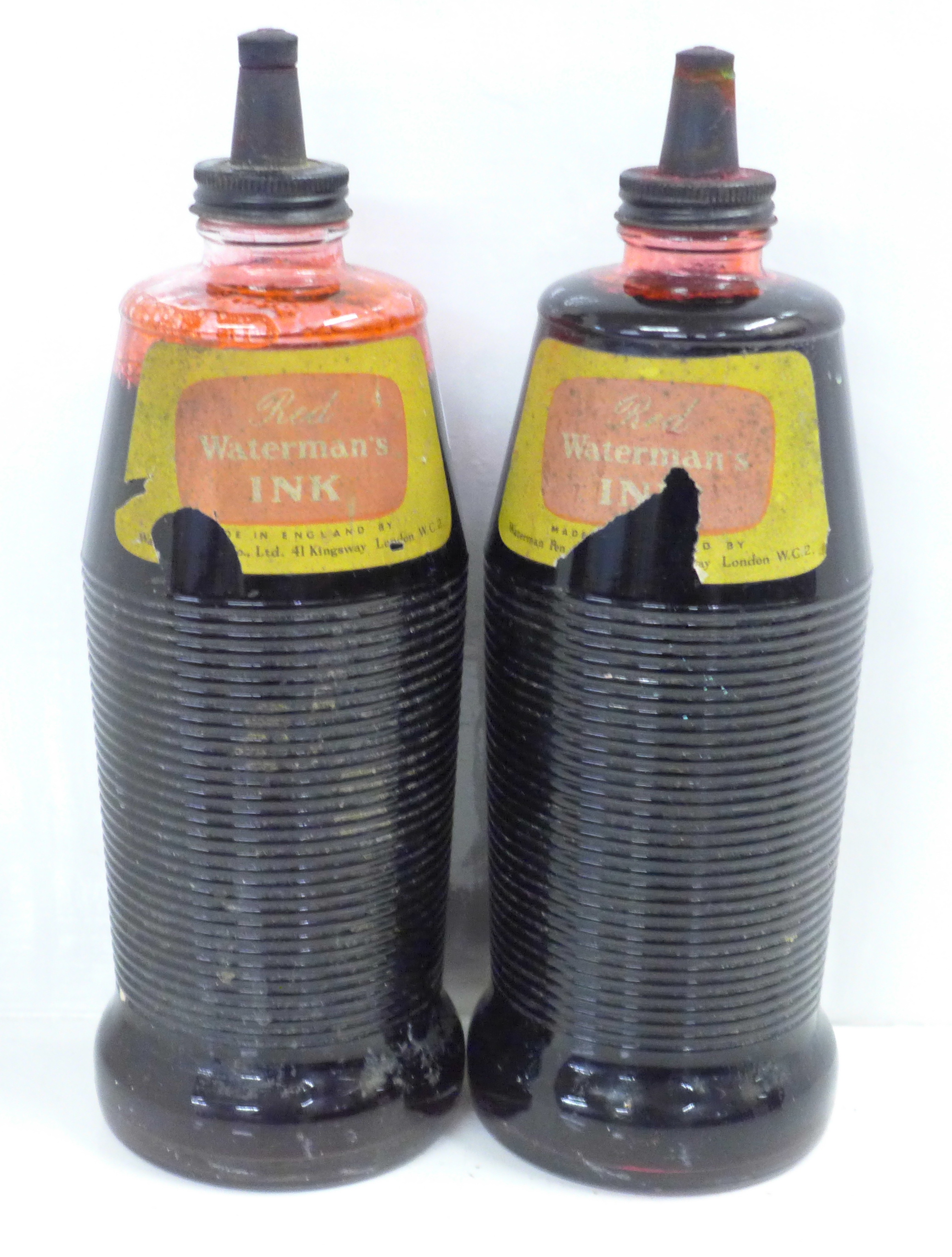 Two large Waterman's ink bottles, with contents