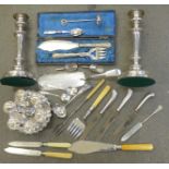A collection of silver plate, a large tray, candlesticks, an egg stand, etc.