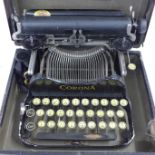 A portable folding Corona typewriter