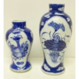 Two Chinese porcelain blue and white vases, largest with Kangxi mark, 19cm and smaller vase 14cm,