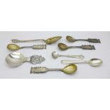 A set of four Swedish silver spoon, a silver olive spoon and three other spoons