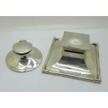Two silver inkwells, largest 12.5cm x 12.5cm, hinge strained, circular a/f dented