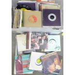 A large box of 1960's, 1970's and 1980's 7" vinyl singles