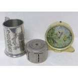 A Smiths novelty alarm clock, a Yorkshire Penny Bank Ltd. money bank and a pewter tankard, Kings and