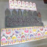 Three Indian embroideries, one wall hanging and two Torans 98cm x 34cm and 130cm x 60cm