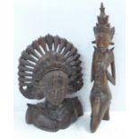 Two carved figures of eastern deity