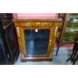 A Victorian style marquetry inlaid walnut and gilt metal mounted pier cabinet