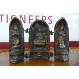 A small oriental bronze triptych