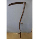 A vintage wooden scythe