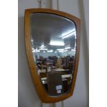 A Danish teak framed bevelled mirror