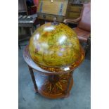 A terrestrial globe cocktail trolley/cabinet