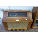 A vintage walnut valve radio