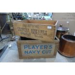 Two wooden advertising crates