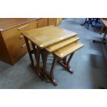 A teak nest of tables