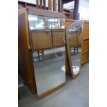 Two teak framed mirrors