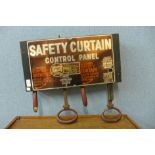 A theatre safety curtain control panel