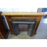 A cast iron fire surround and one other