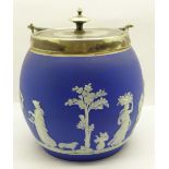 A Wedgwood Jasperware biscuit barrel with inscription on the underside of the lid dated 1881