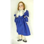 A German Armand Marseille bisque head doll, fixed brown eyes, 390 A5M identification mark, c1915-