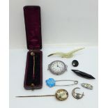 Two stick pins, an enamelled wristwatch head, a/f, two brooches, etc.