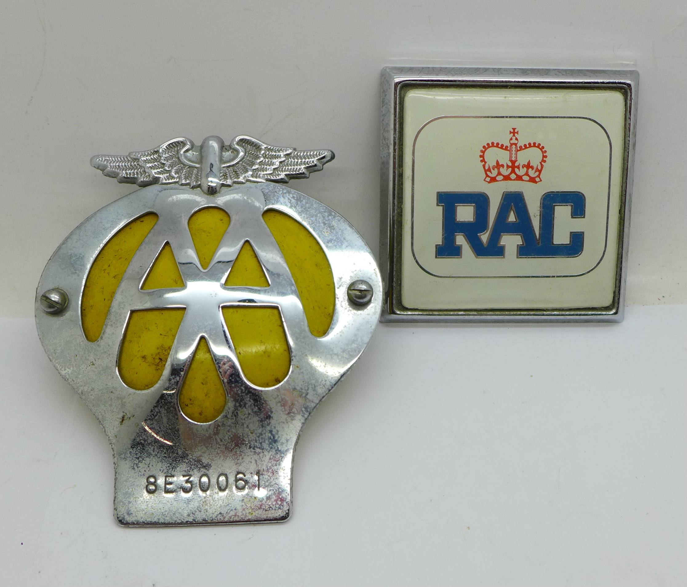 Two car badges; RAC and AA
