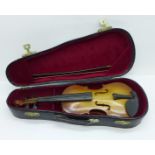 A miniature violin, cased, 22.5cm