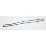 A cultured pearl necklace, clasp marked 750