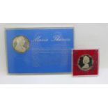 A Marie Theresia coin and a 1977 souvenir medal