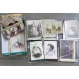 A box of over 100 Victorian cabinet photographs