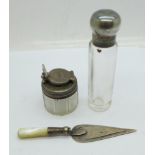 A silver topped glass pot with screw fastener, a silver and mother of pearl bookmark and a scent