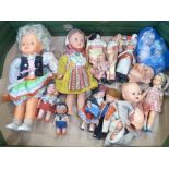 A collection of costume and other early plastic dolls