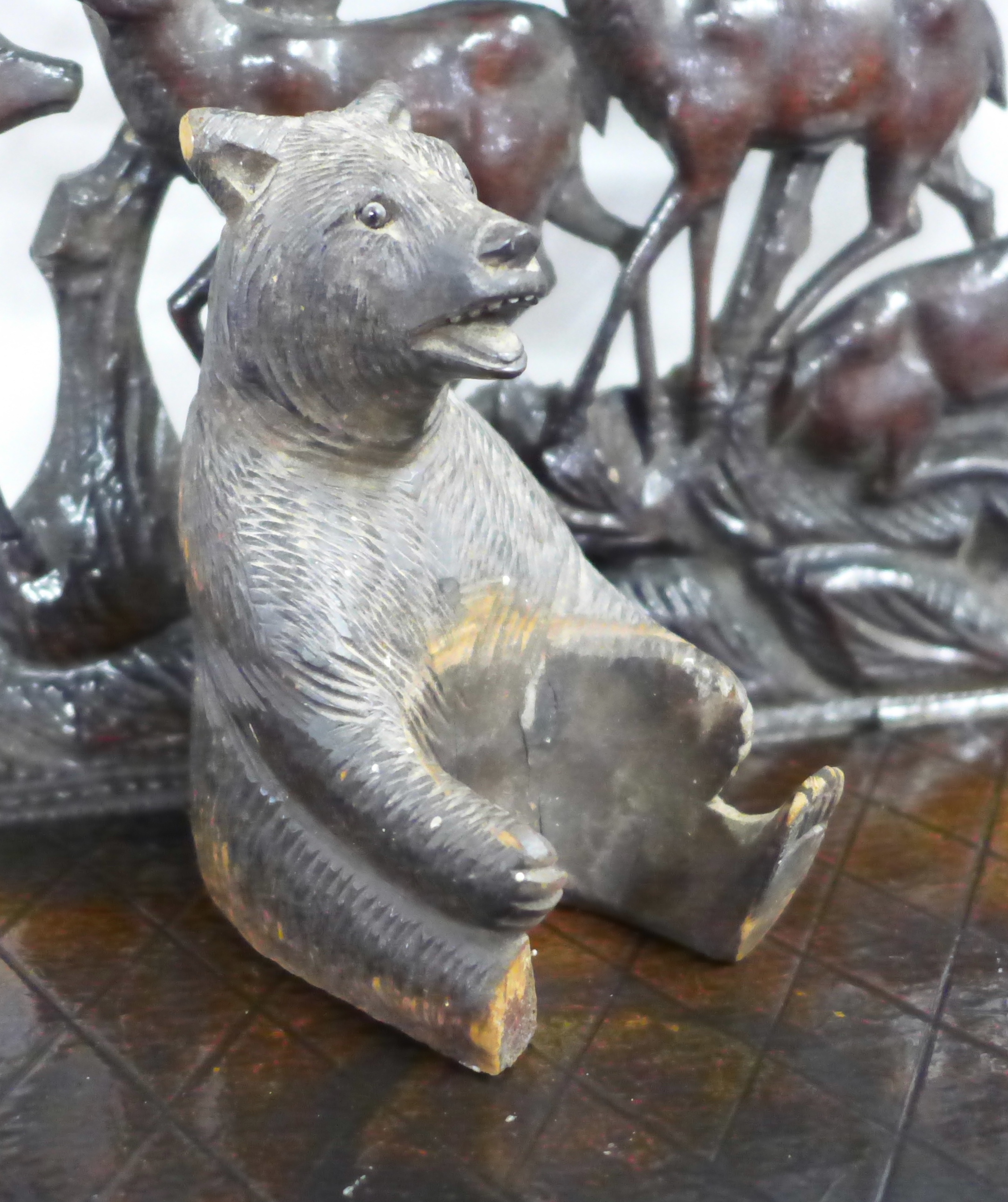 A Black Forest carved seated bear and three carved shelves - Image 5 of 5