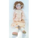 A German Gerbruder Krauss bisque head doll with blue sleep eyes, 265 Gbn 165 k 212 identification