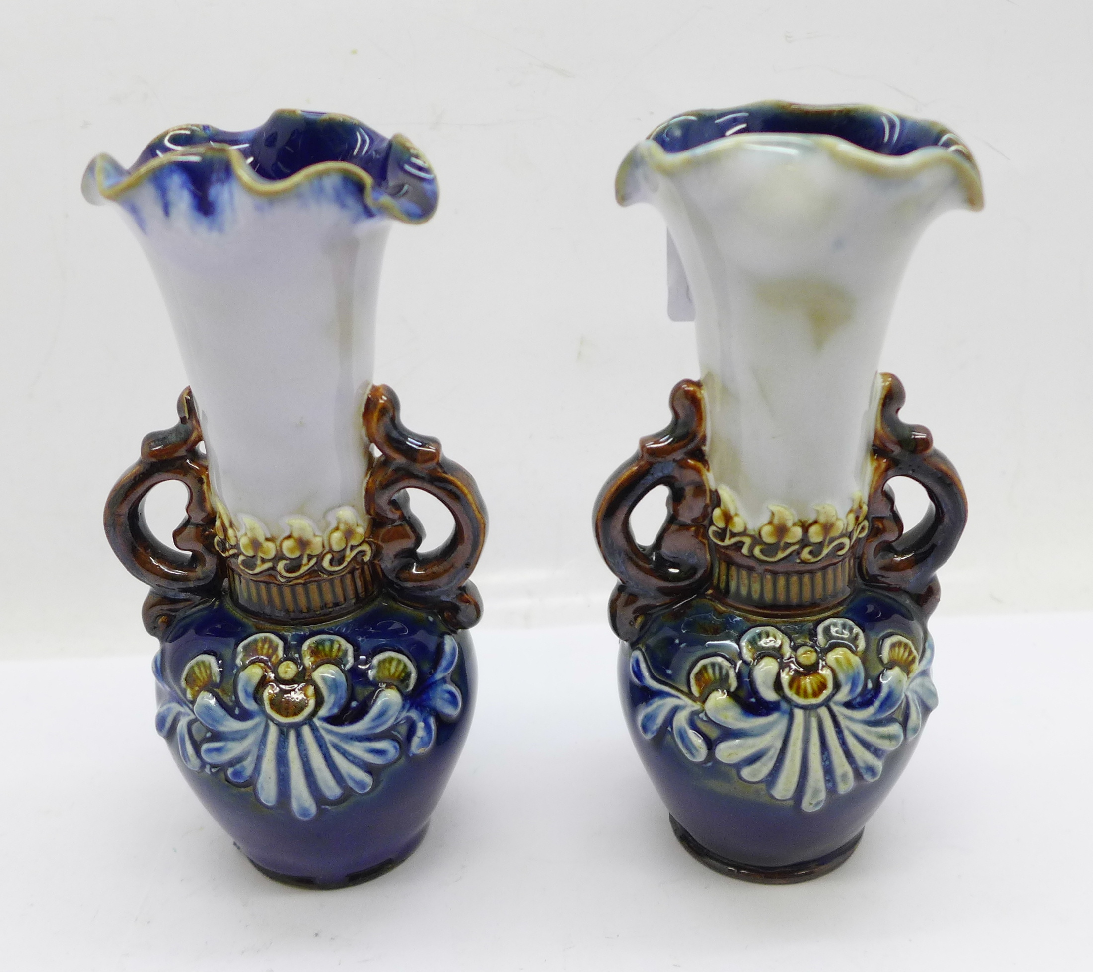 A pair of small Royal Doulton vases, both with small chips to the base, 12.5cm