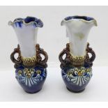 A pair of small Royal Doulton vases, both with small chips to the base, 12.5cm