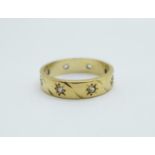 A 9ct gold eternity ring, 2.8g, L