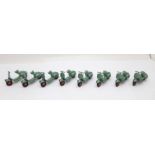 Eight Benbros Mighty Midgets 15 Vespa scooters in metallic green with red hubs