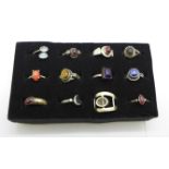 Twelve silver stone set rings