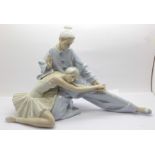 A large Lladro porcelain figure group, ?Closing Scene?, (ref 4935), ballerina and a pierrot,