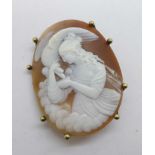 A cameo brooch depicting Hebe and Zeus, 4cm x 5cm