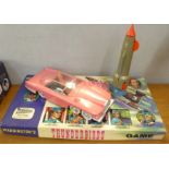 A Waddington's Thunderbirds game, boxed and two Thunderbirds toys