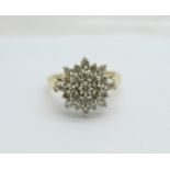 A 9ct gold, twenty-five diamond cluster ring, approximately 0.85ct diamond weight, 4.9g, S