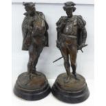 A pair of spelter figures, 43cm