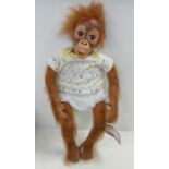 An Ashton-Drake baby baboon figure, 'Baby-Babu', boxed
