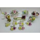 A collection of flower ornaments including six Coalport name holders, Royal Doulton and Royal