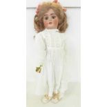 A Simon & Halbig bisque head doll with brown sleep eyes, SH 6½ identification mark, circa 1910, 43cm