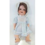 A German Armand Marseille bisque head doll with brown sleep eyes, 996 A3M identification mark, circa