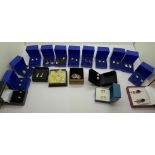 Nineteen pairs of earrings; silver and silver gilt and one pair of 9ct gold hoop earrings, 0.6g